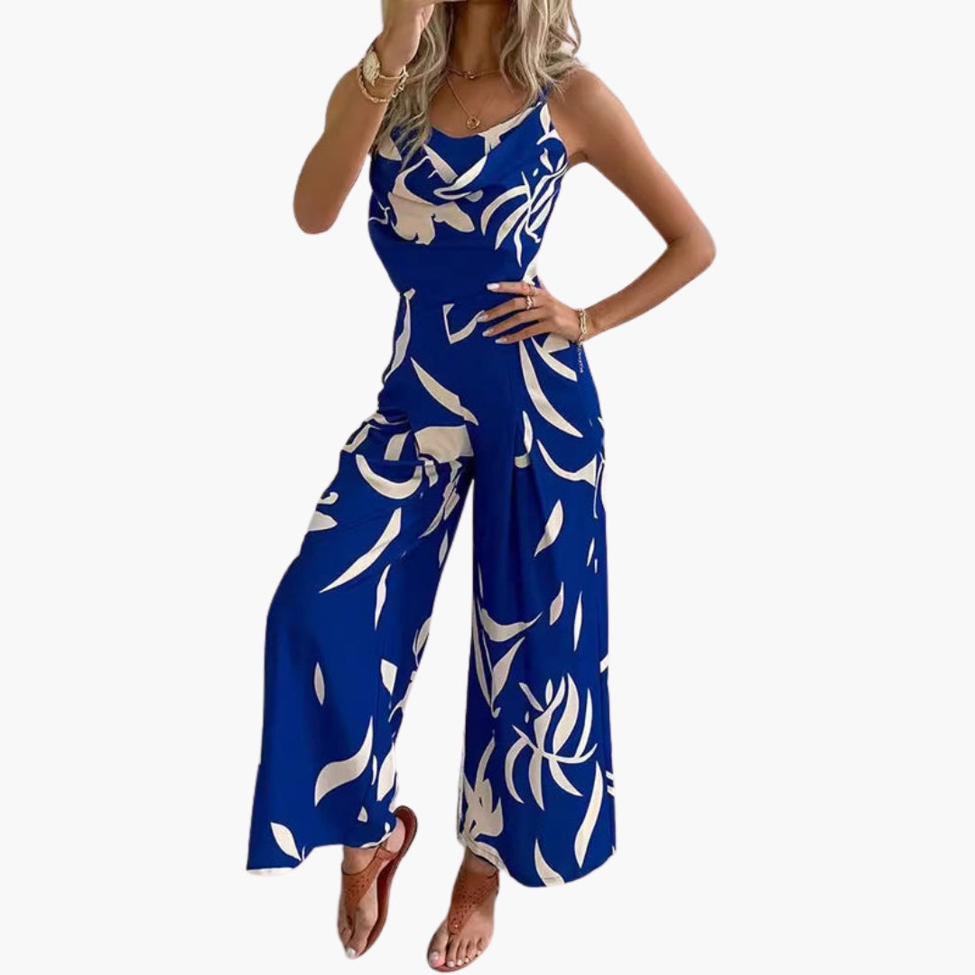Damoverall med draperad halsringning och vida ben