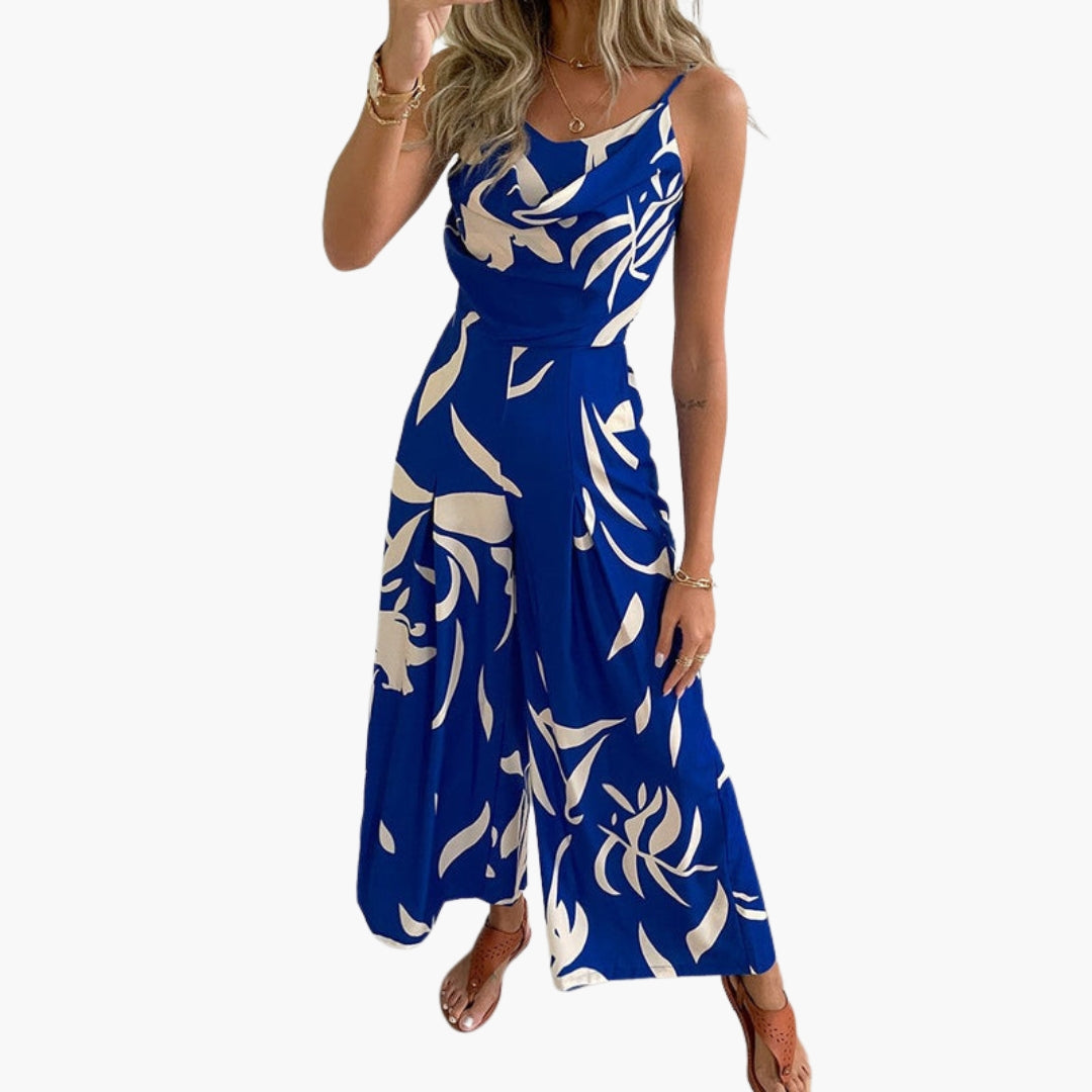 Damoverall med draperad halsringning och vida ben