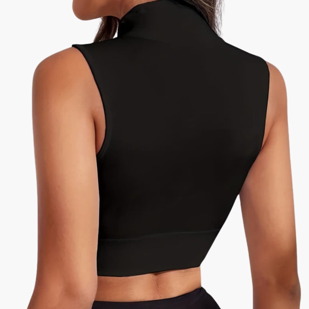 Top sportivo corto da donna con collo alto e chiusura lampo
