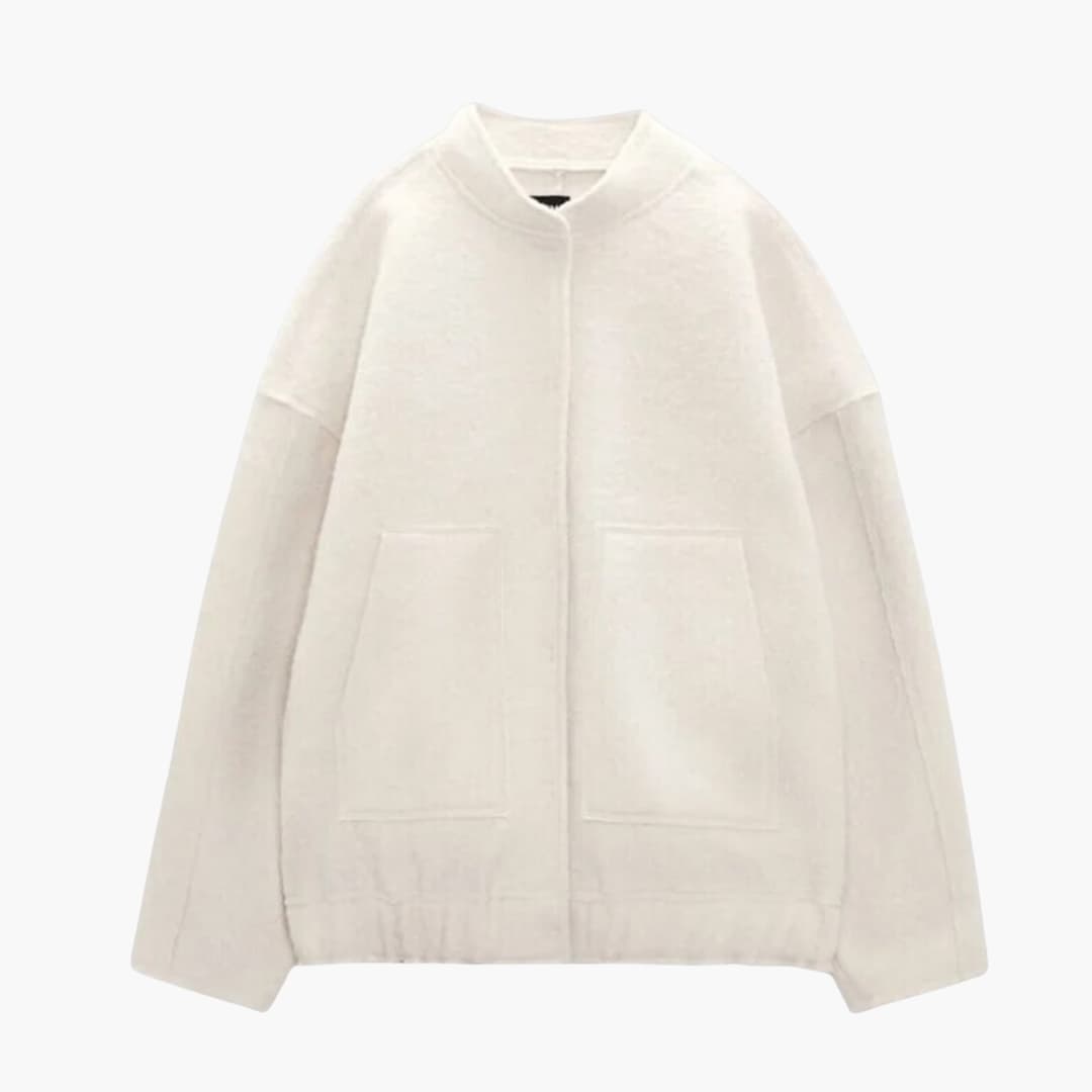Dame bomber oversize med forlommer og skjult lukning