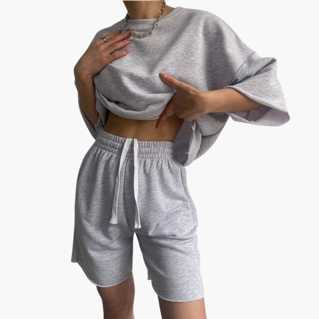 Women's sports set with crop top and drawstring shorts