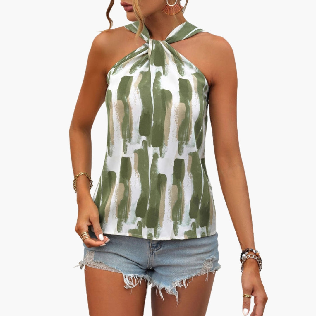 Top donna con collo halter e superficie stampata