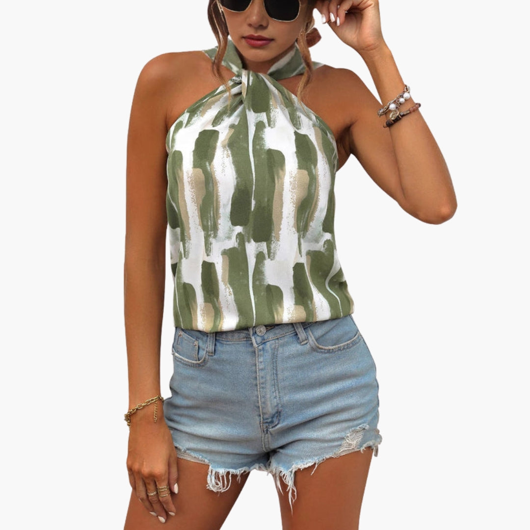 Top donna con collo halter e superficie stampata