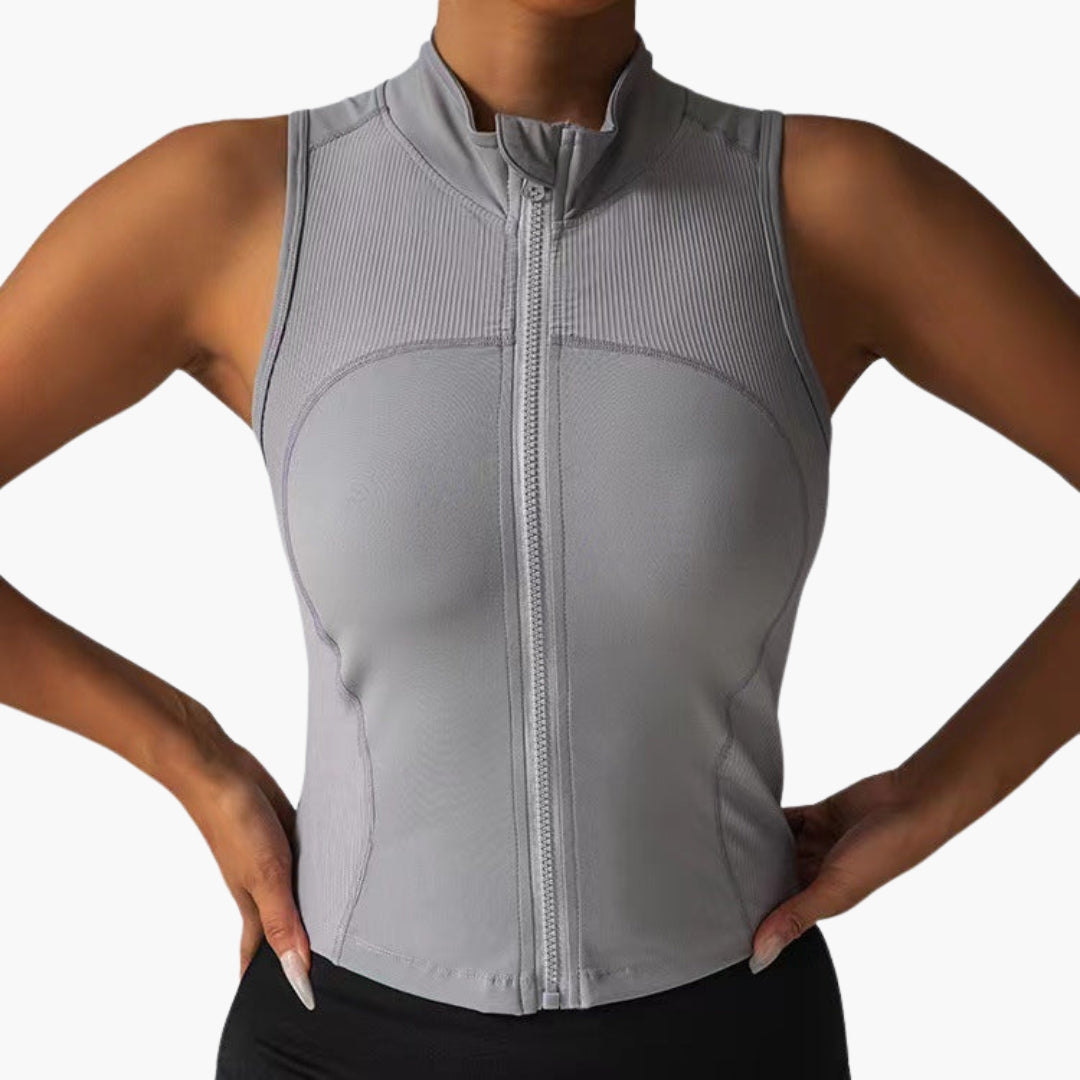 Haut de sport femme avec fermeture zippée et col montant