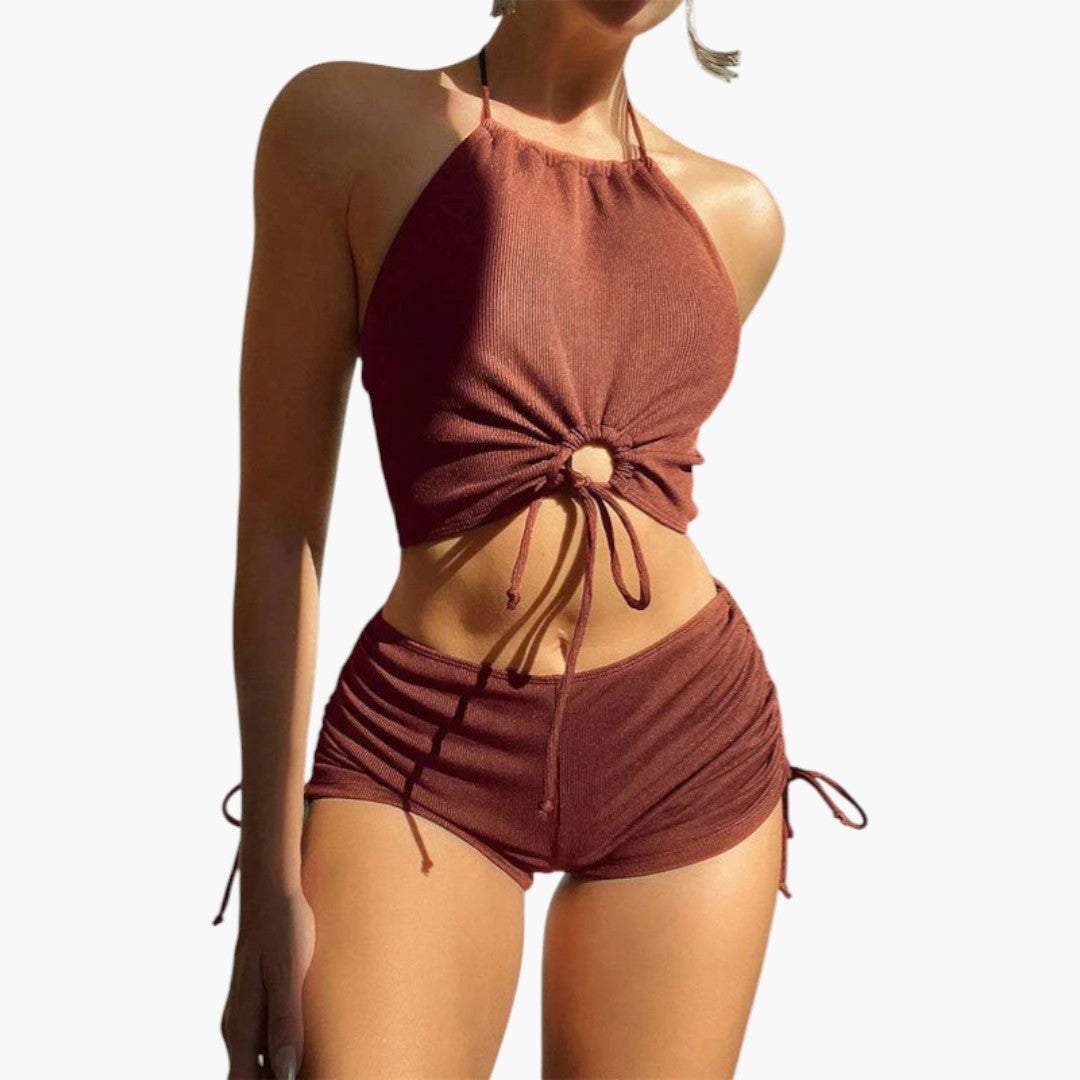 Women's swimsuit with a low back top and high-waisted shorts