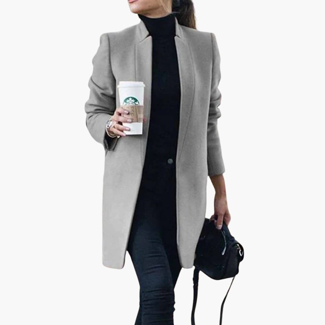 Abrigo mujer largo corte slim con abertura frontal