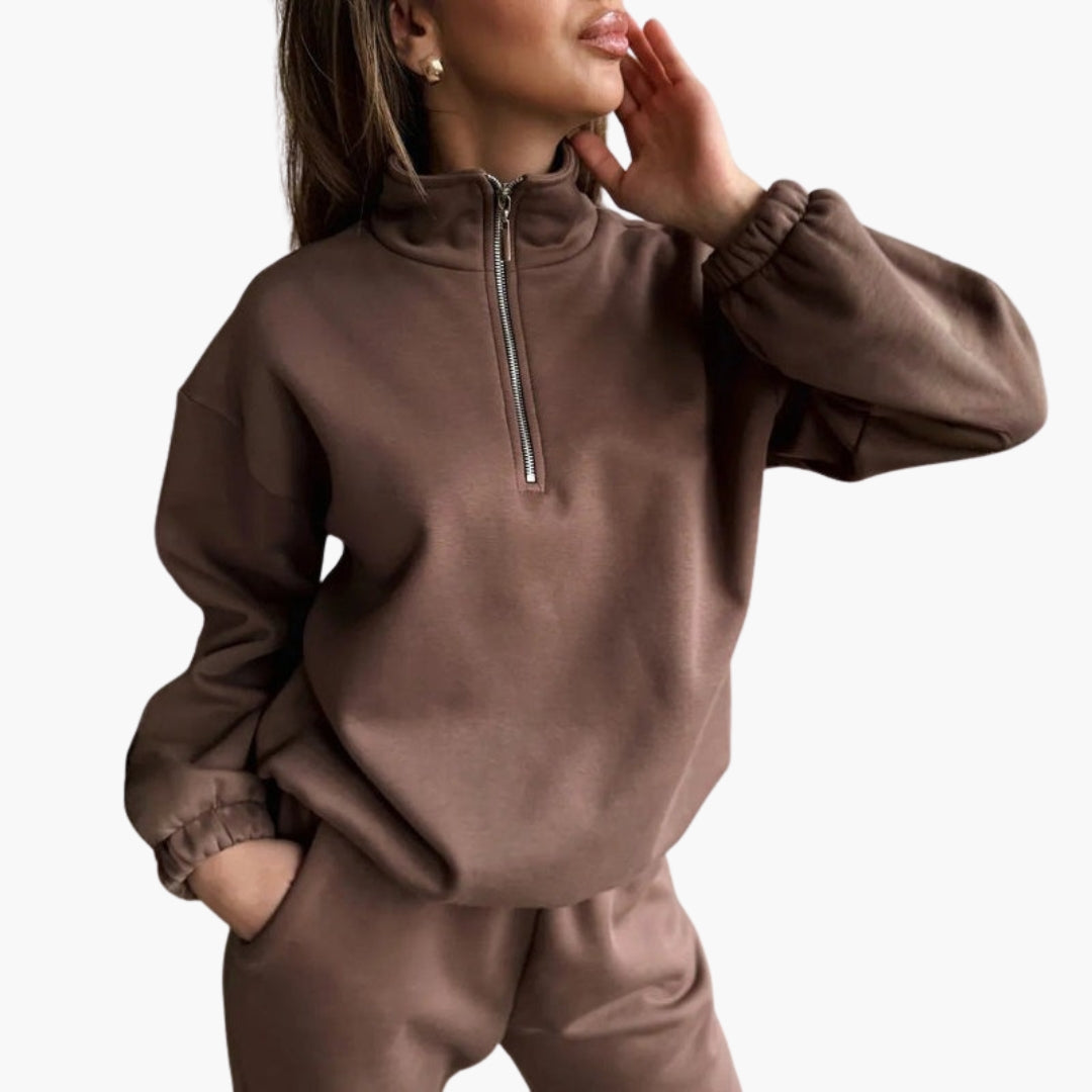 Women's sports pullover with high collar and half zip