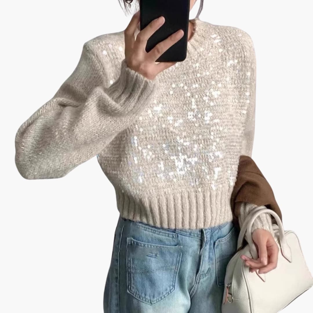 Pull em malha para mulher com decote redondo e superfície texturizada