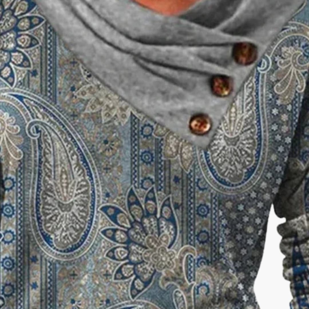 Pull femme à col drapé et motif ornemental