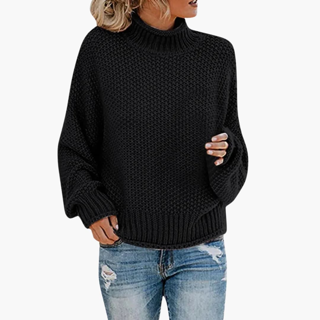 Pull femme à col montant et bords côtelés