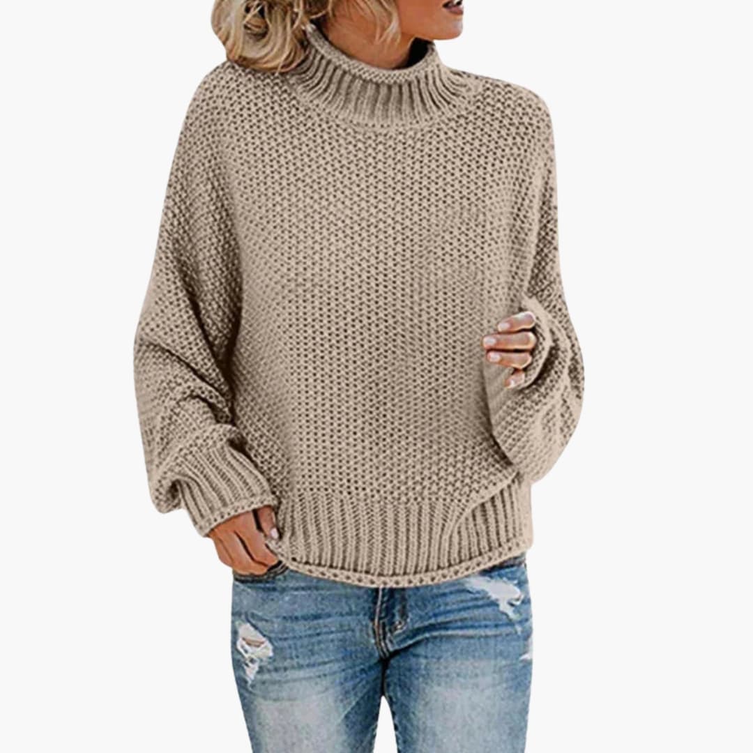 Pull femme à col montant et bords côtelés