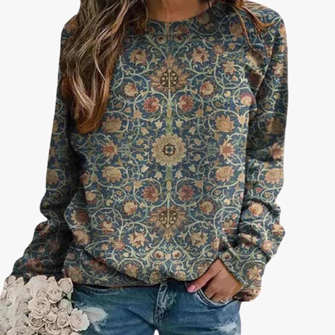 Pull femme avec motif fleuri et surface tricotée