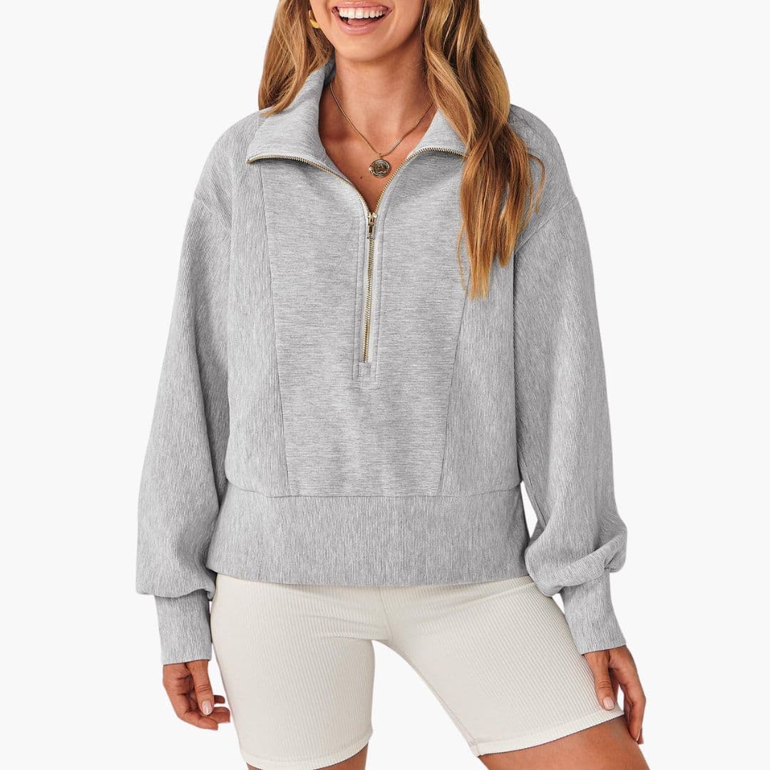 Women's sporty pullover with high collar and zip closure