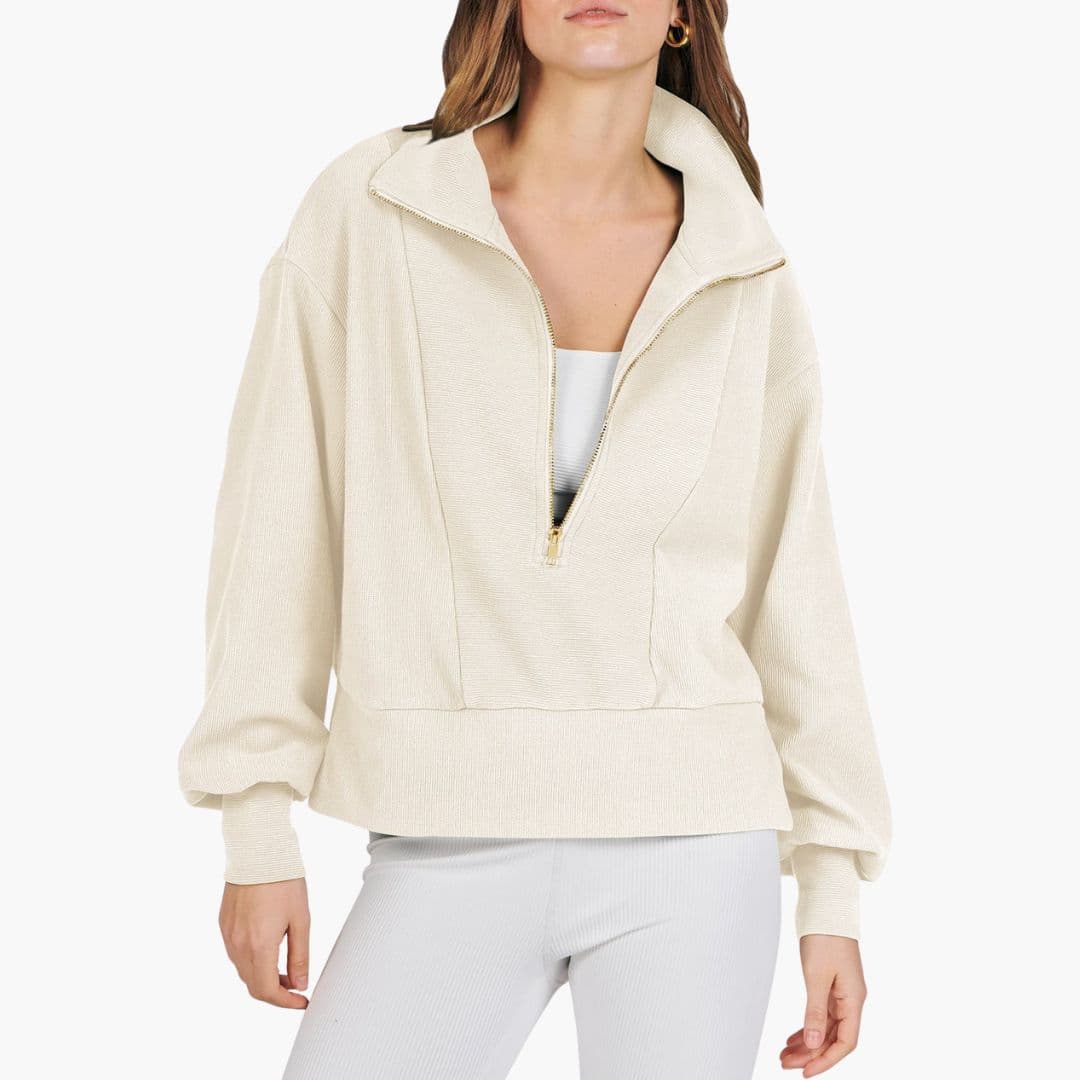 Women's sporty pullover with high collar and zip closure