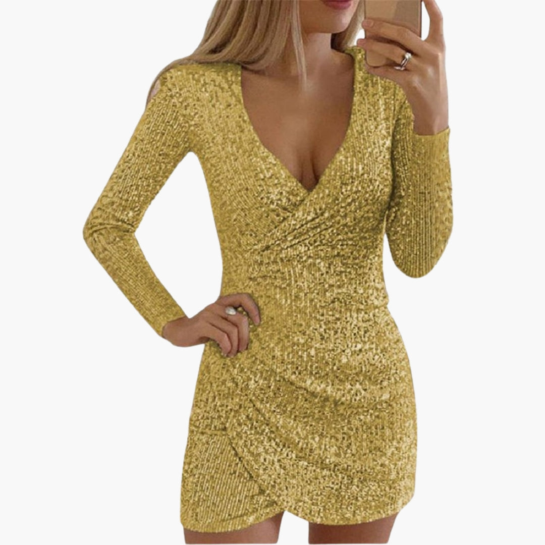 Women's dress with sequins and asymmetrical hem