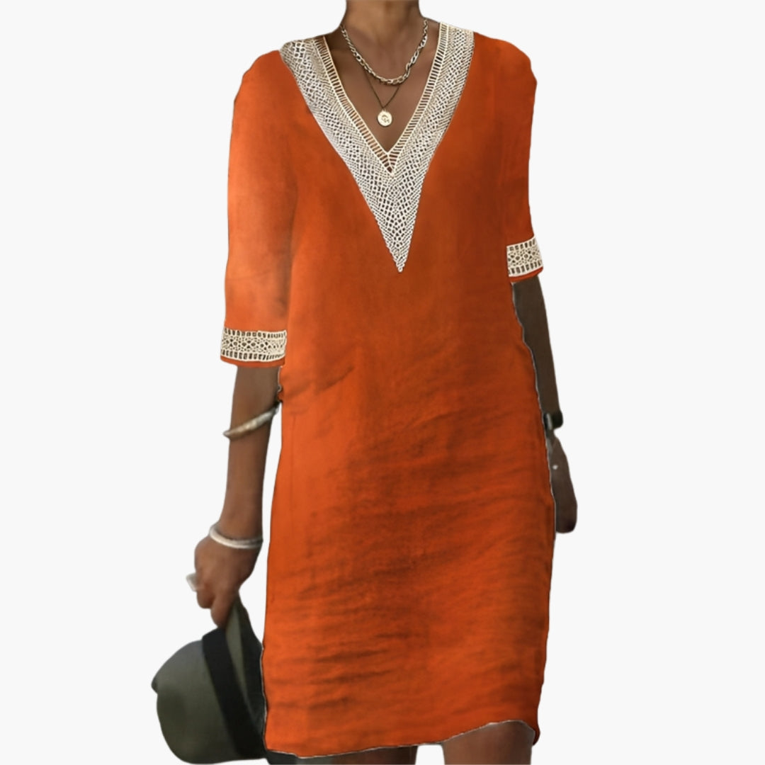 Abito donna con scollo a V e rifiniture in pizzo