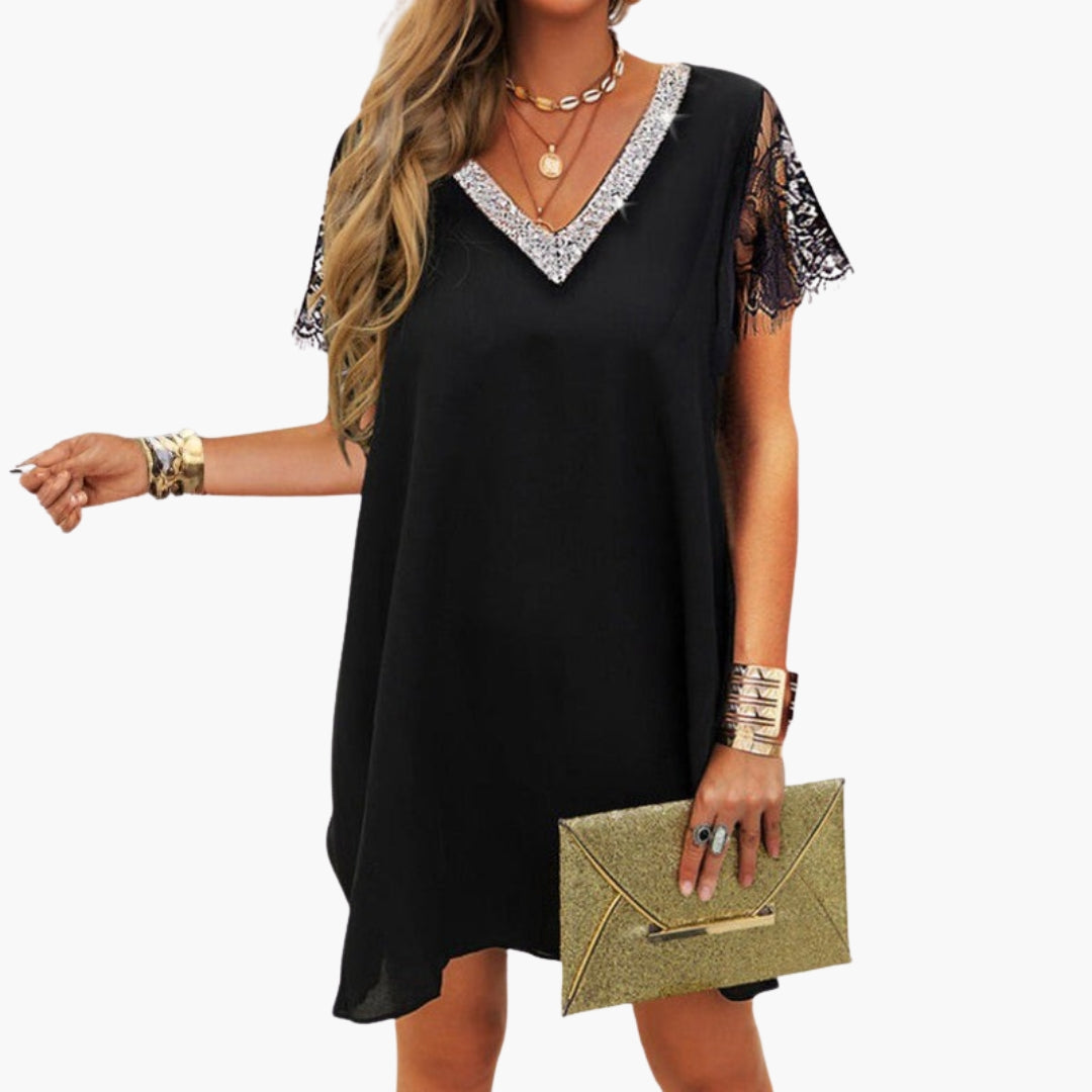 Robe de mulher com mangas curtas e acabamentos em lantejoulas
