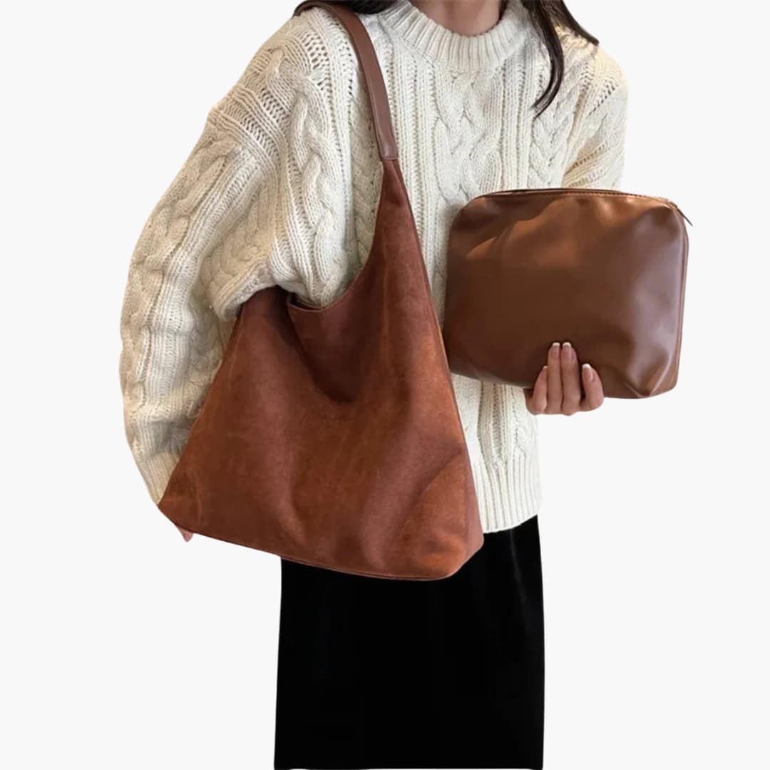 Borsa a mano per donna dal design essenziale tracolla regolabile