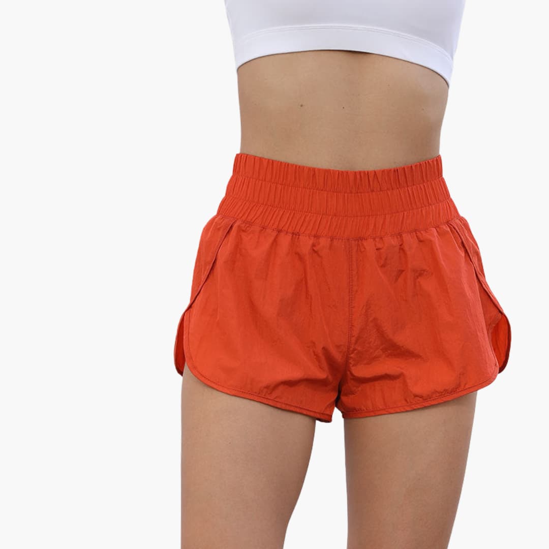 Women's running shorts with elastic waistband and side pockets