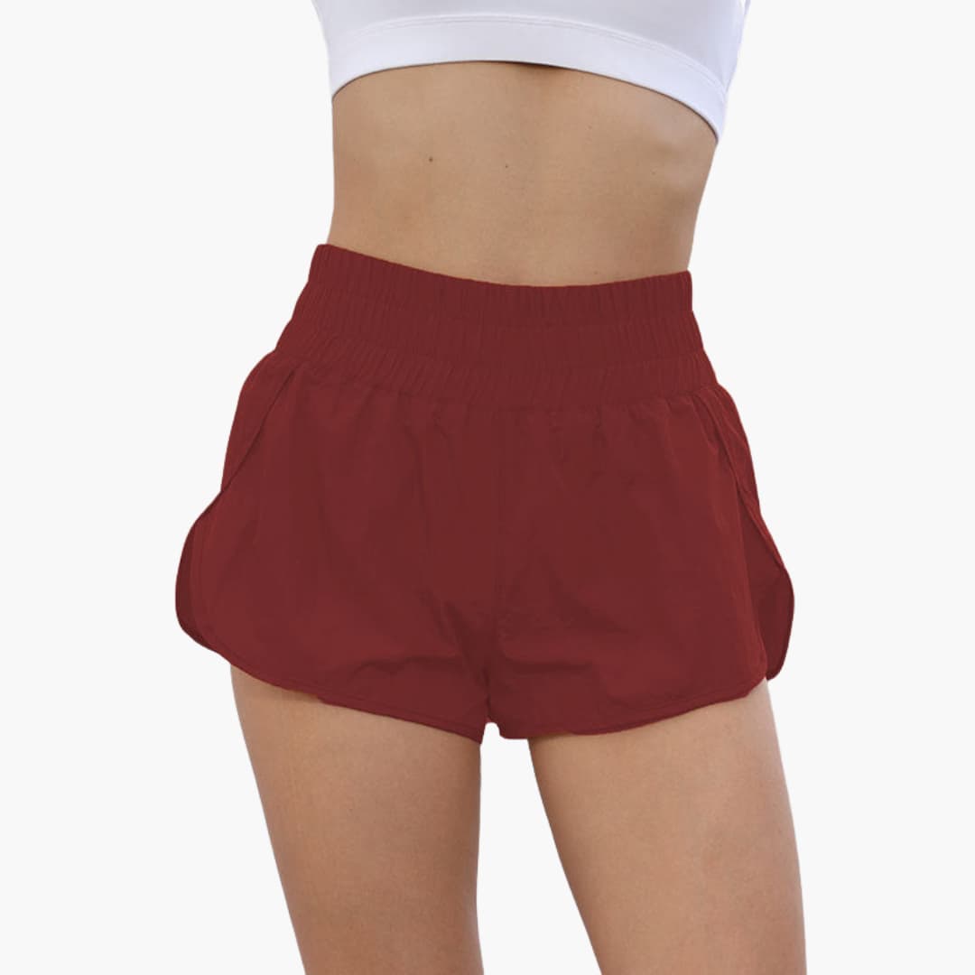Women's running shorts with elastic waistband and side pockets