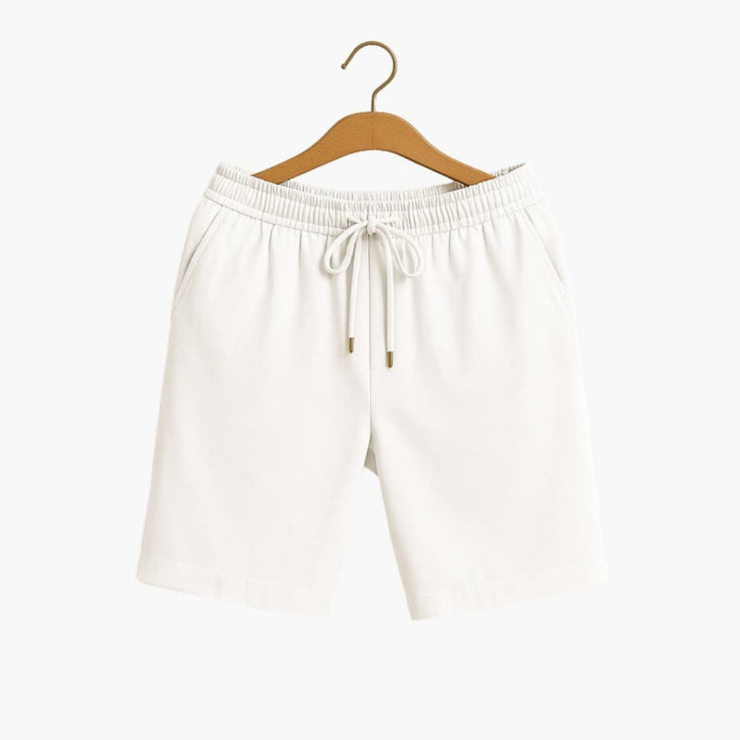 Short homme a taille à poches latérales et surface unie