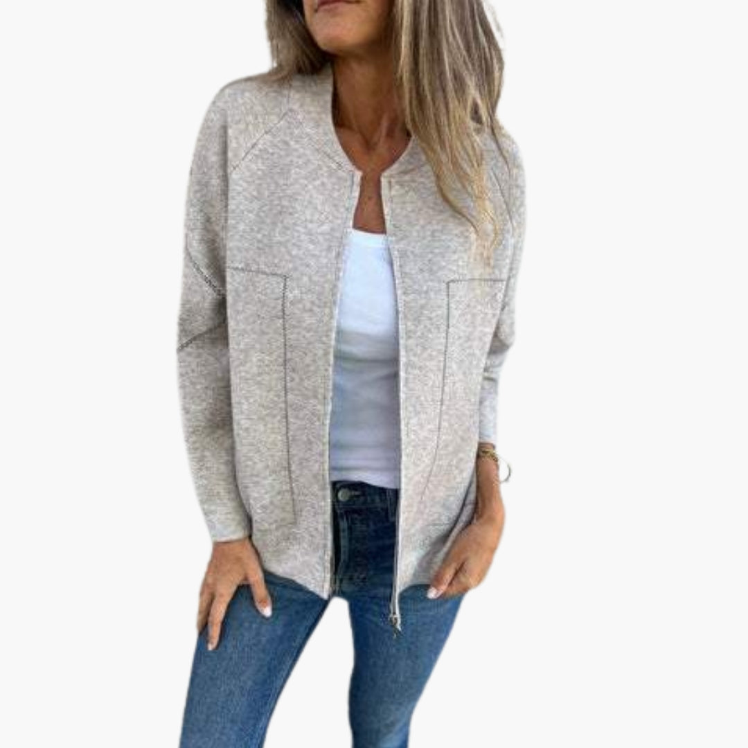 Women's zip-up jacket with round collar and side pockets