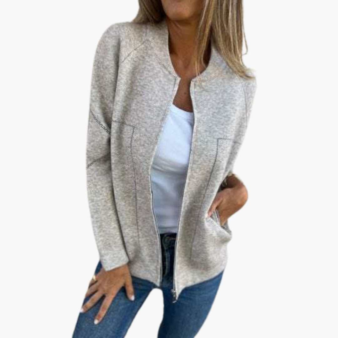 Women's zip-up jacket with round collar and side pockets