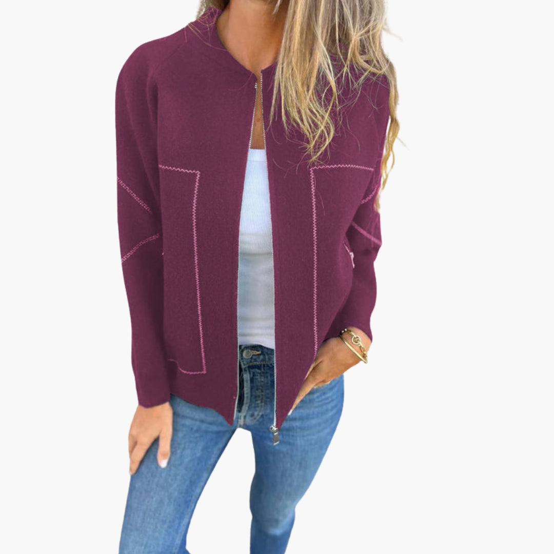 Women's zip-up jacket with round collar and side pockets