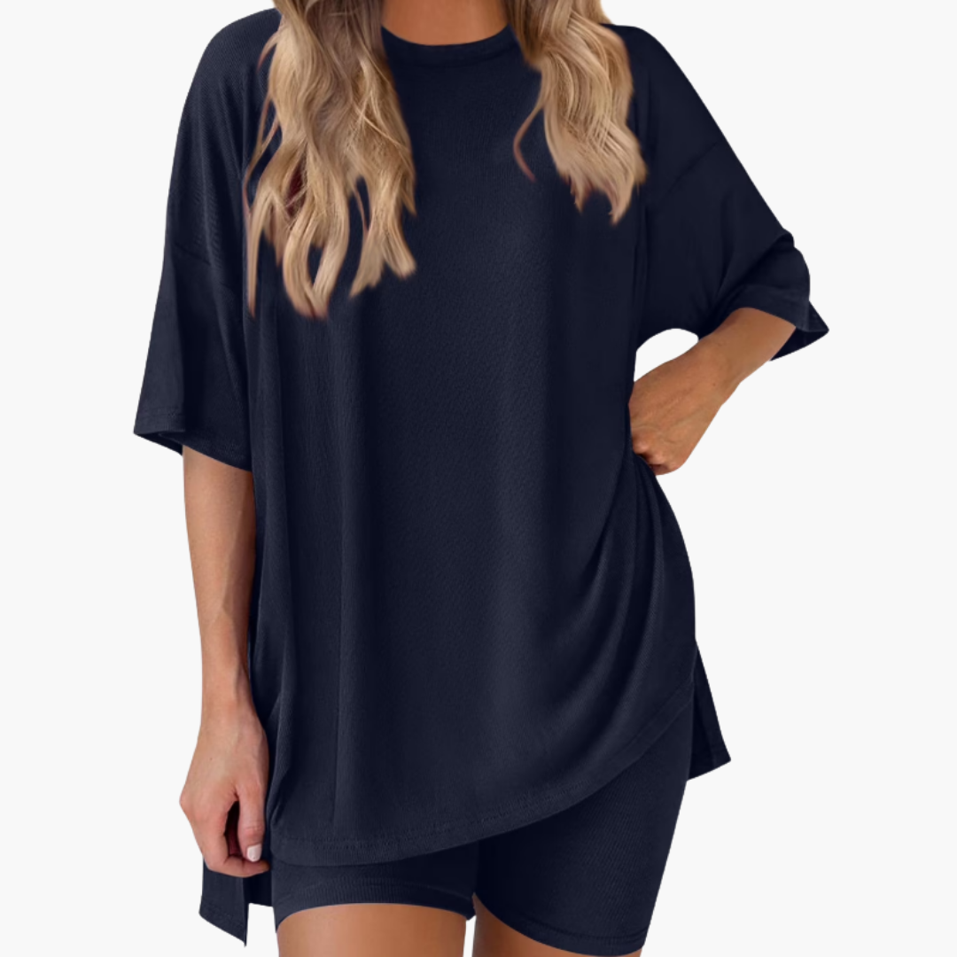 Completo sportivo donna con top a collo a V e pantaloncini larghi
