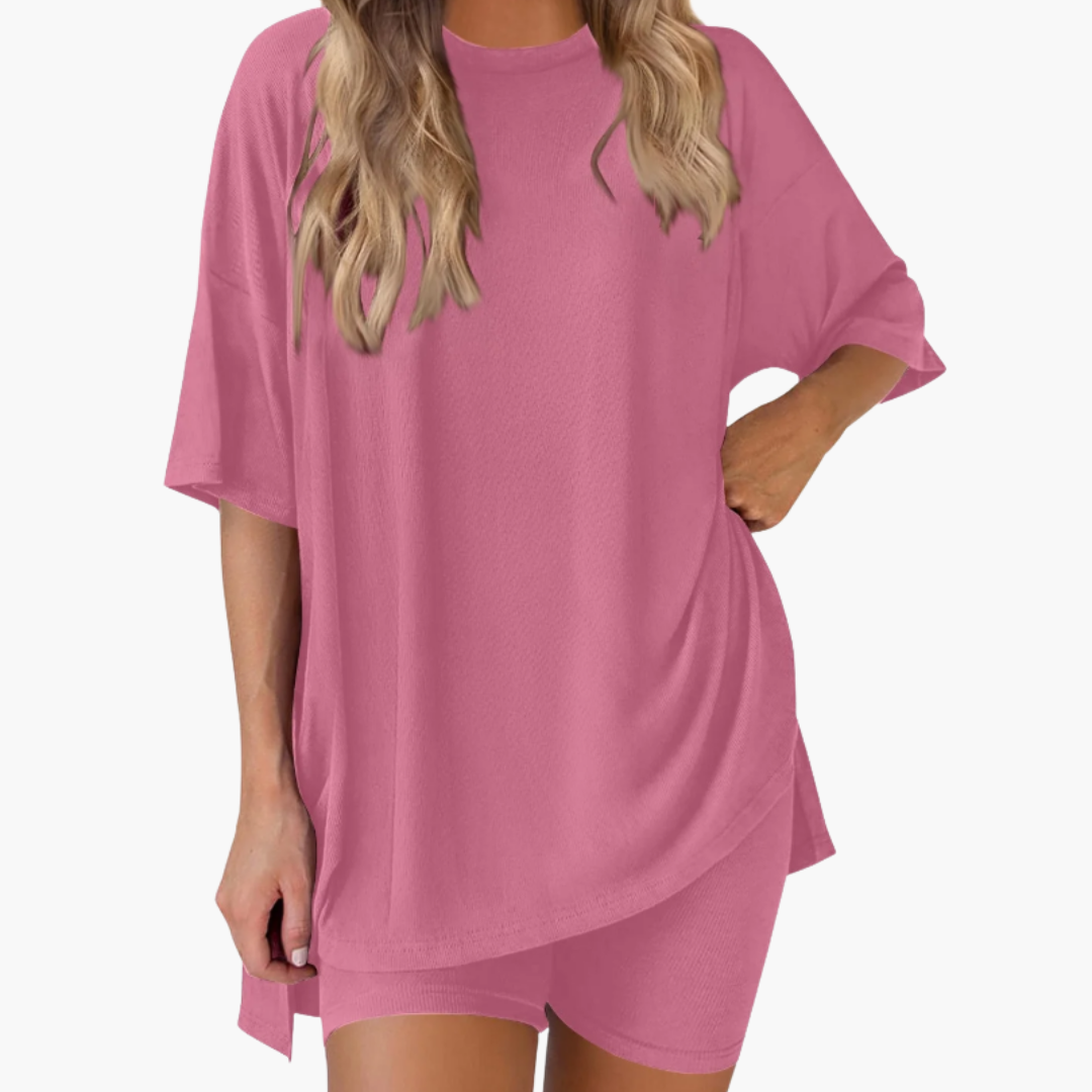Completo sportivo donna con top a collo a V e pantaloncini larghi