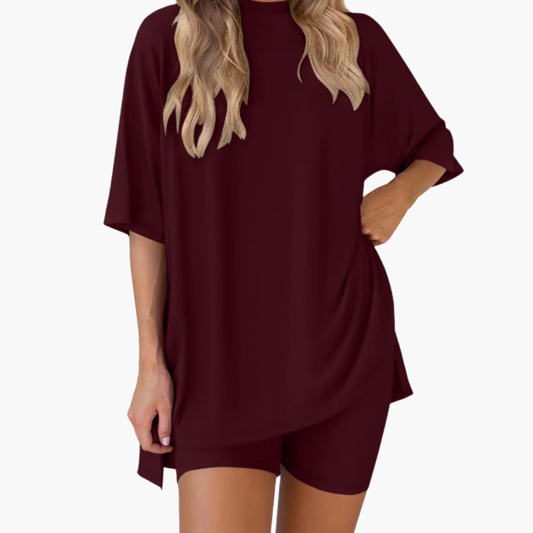 Completo sportivo donna con top a collo a V e pantaloncini larghi