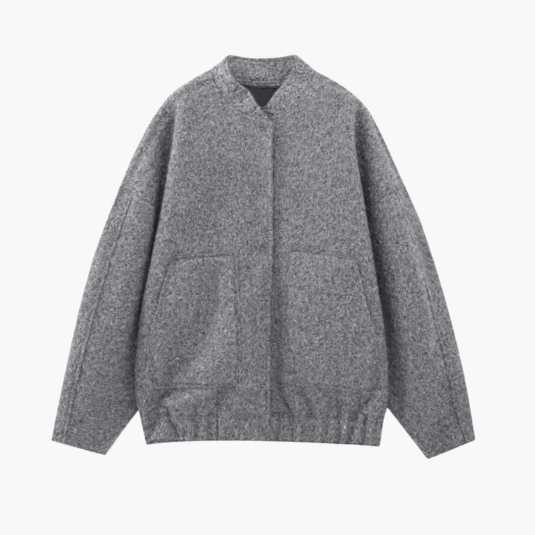 Dame bomber oversize med forlommer og skjult lukning