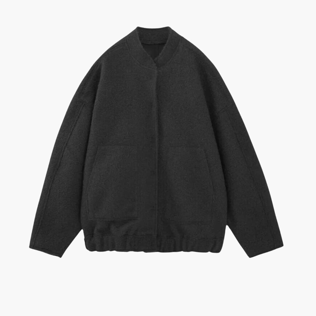 Dame bomber oversize med forlommer og skjult lukning