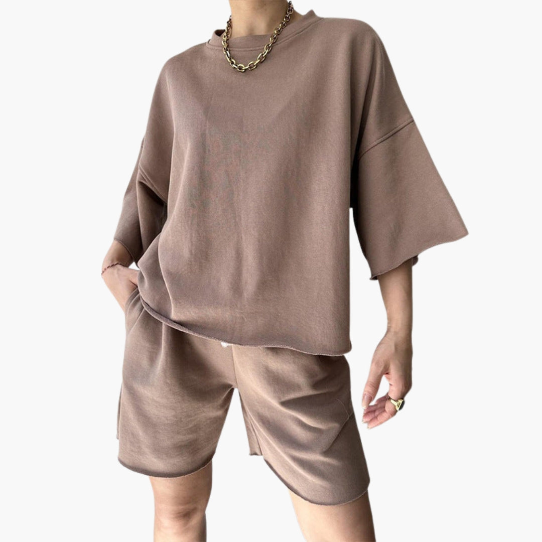 Damesportsett med kort topp og shorts med snor