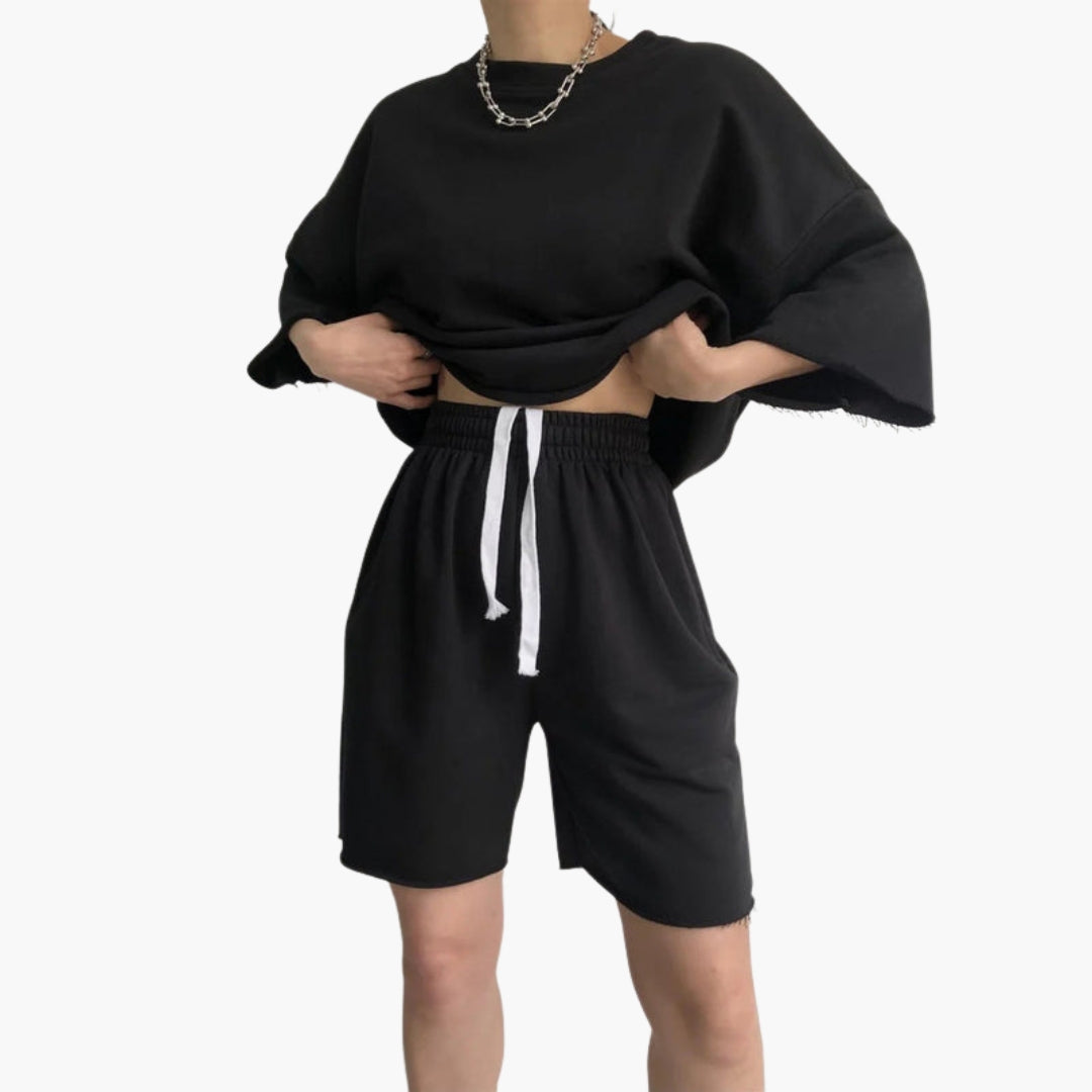 Damesportsett med kort topp og shorts med snor