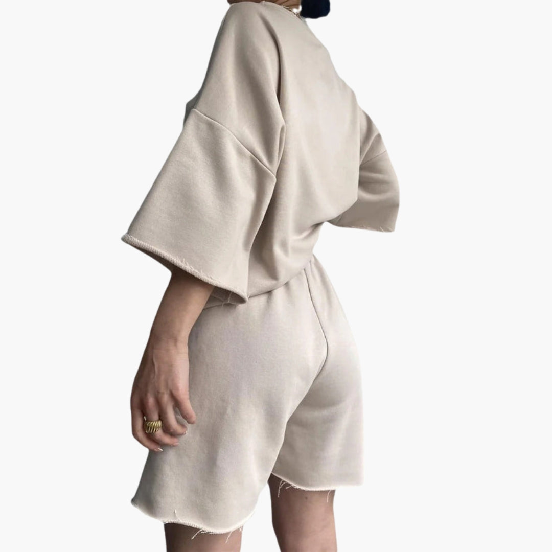 Damesportsett med kort topp og shorts med snor