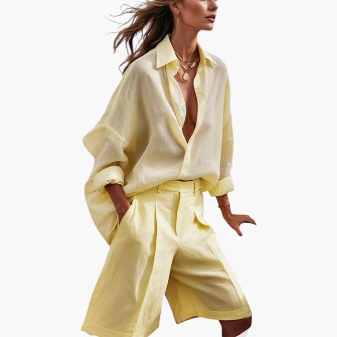 Completo donna con camicetta abbottonata e pantaloni larghi