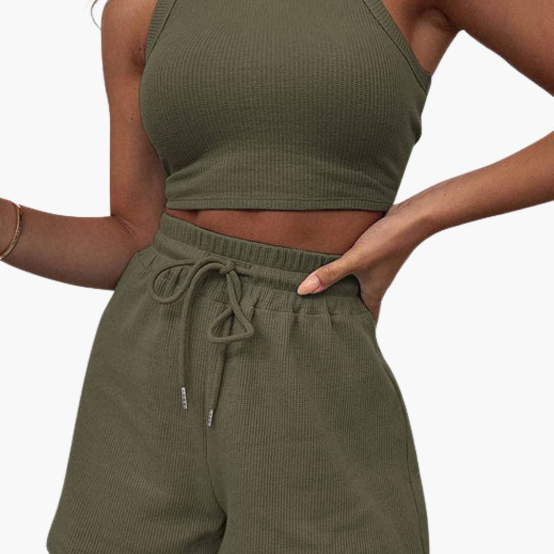 Completo sportivo donna con top a schiena scoperta e pantaloncini