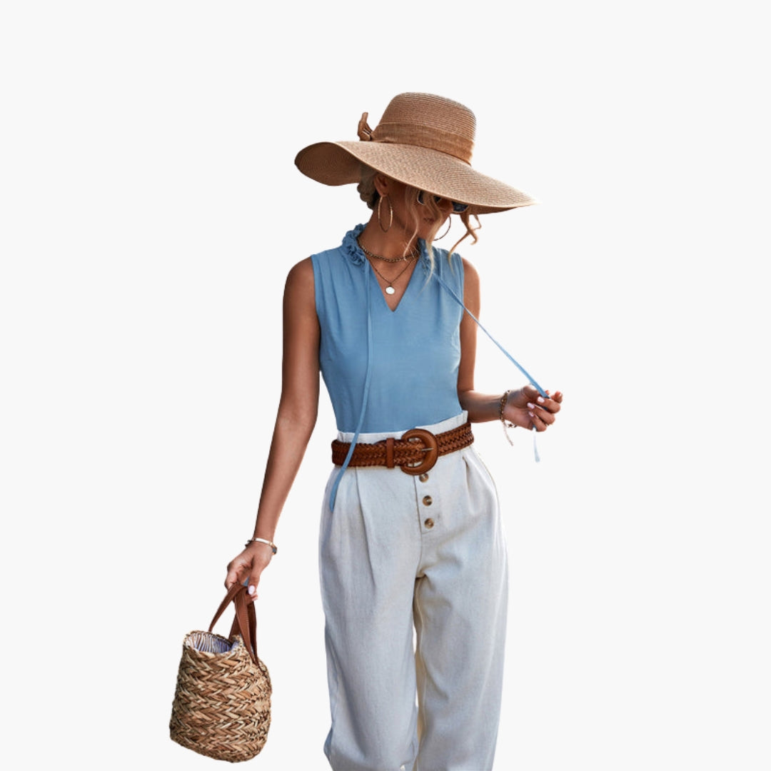 Top donna senza maniche con collo a volant