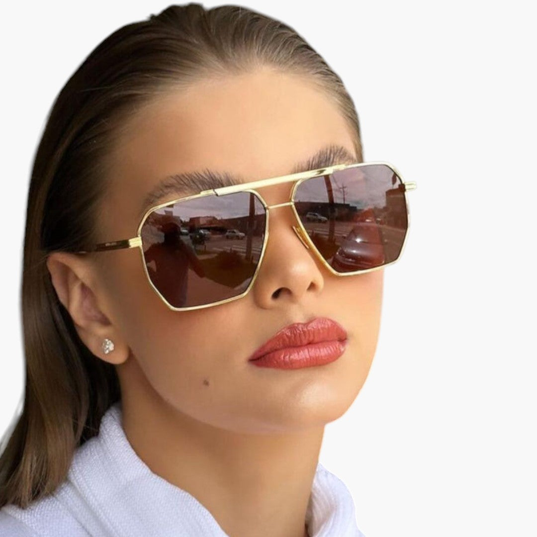 Lunettes de soleil femmes a monture métallique et verres polarisés
