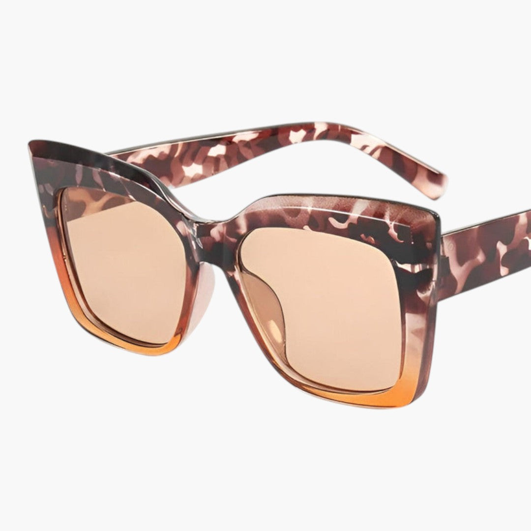 Lunettes de soleil femmes avec forme cat-eye et verres dégradés