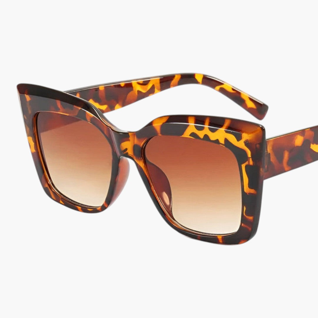 Lunettes de soleil femmes avec forme cat-eye et verres dégradés