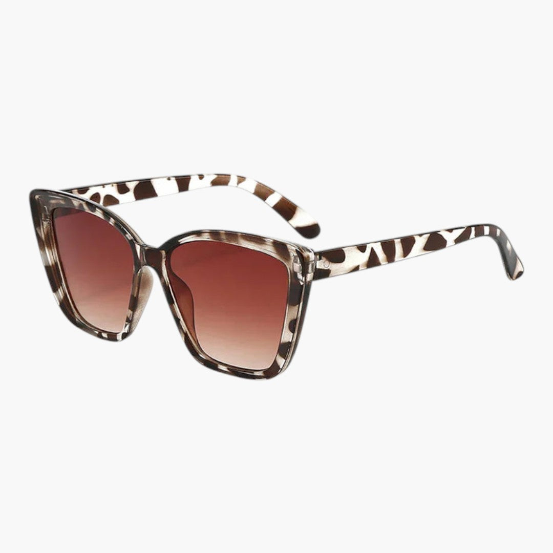 Lunettes de soleil femmes avec verres teintés et forme œil de chat