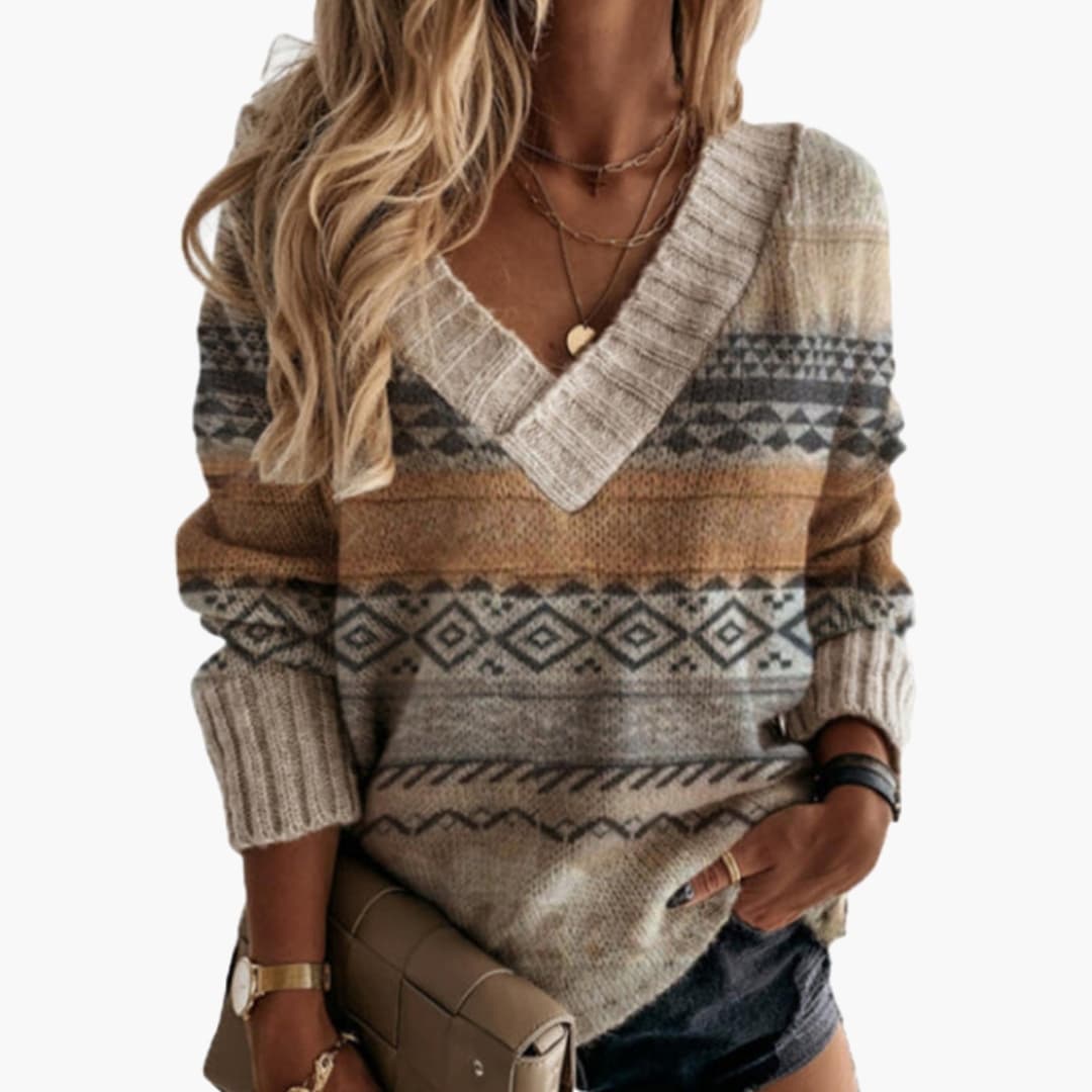 Maglione a rete donna con scollo a V e superficie a motivo