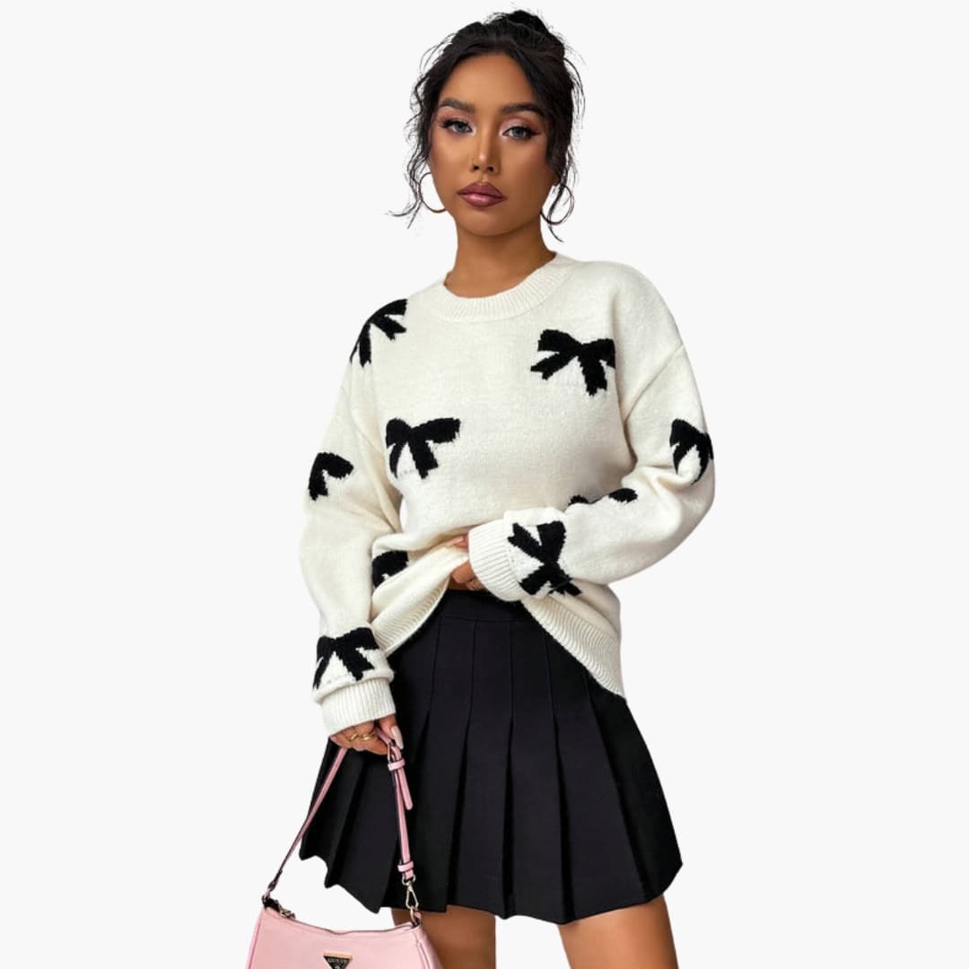 Knitted sweater for women with bow pattern and round neck