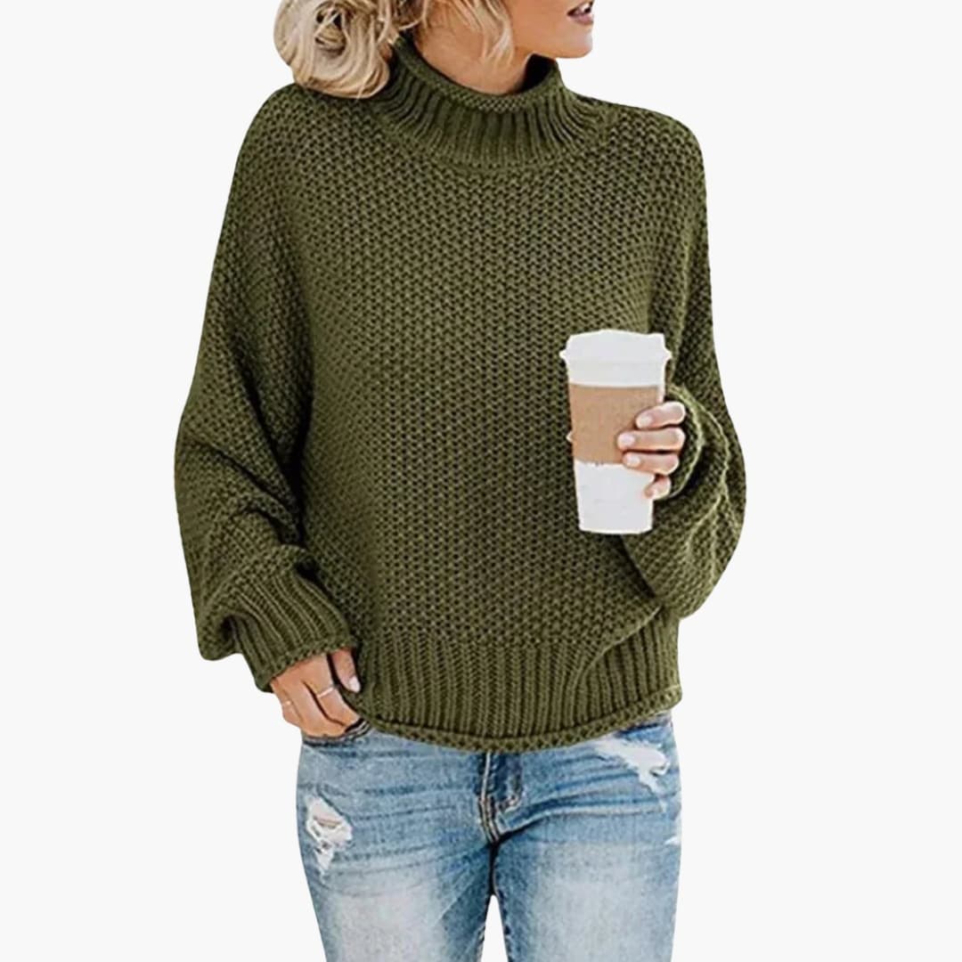 Pull femme à col montant et bords côtelés