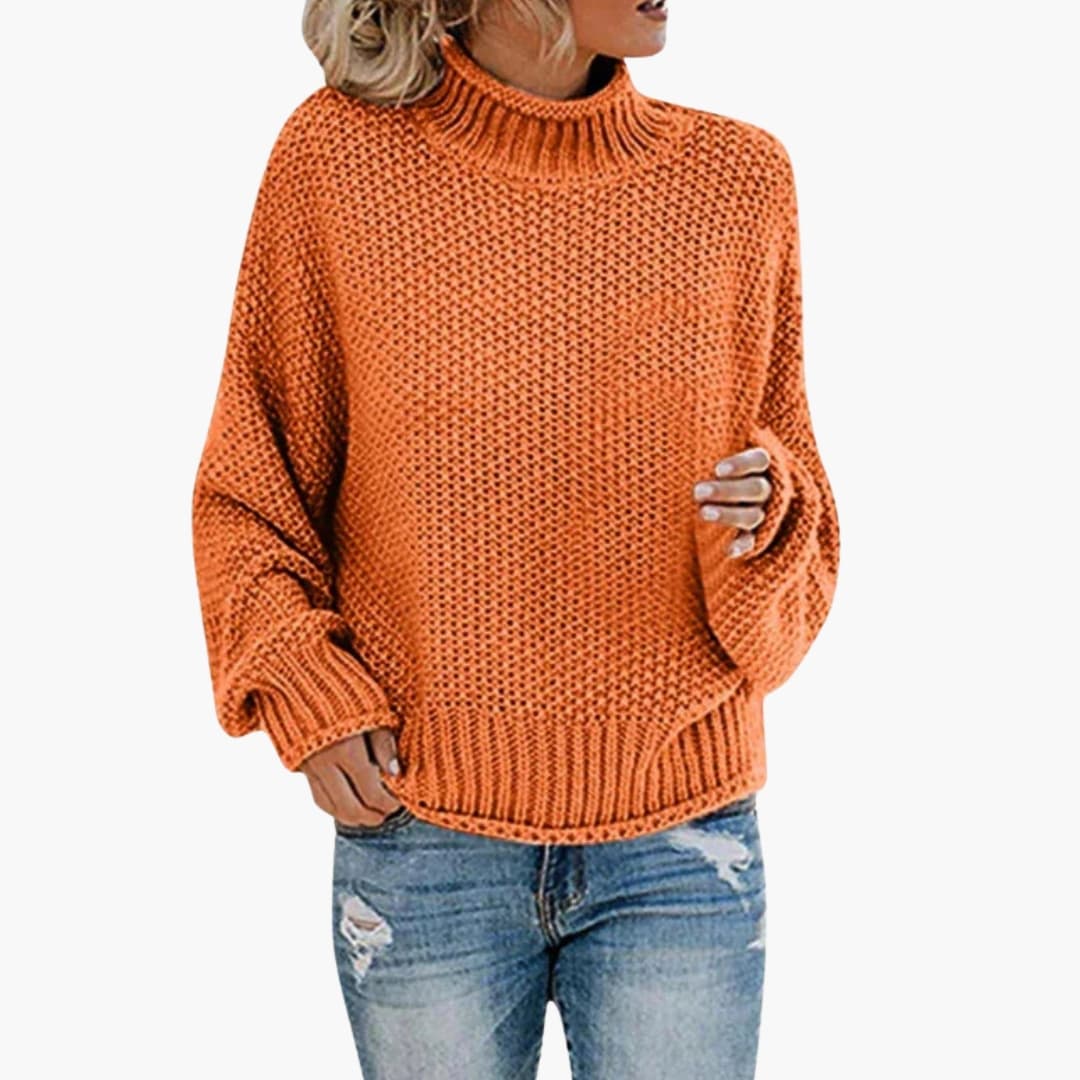 Pull femme à col montant et bords côtelés