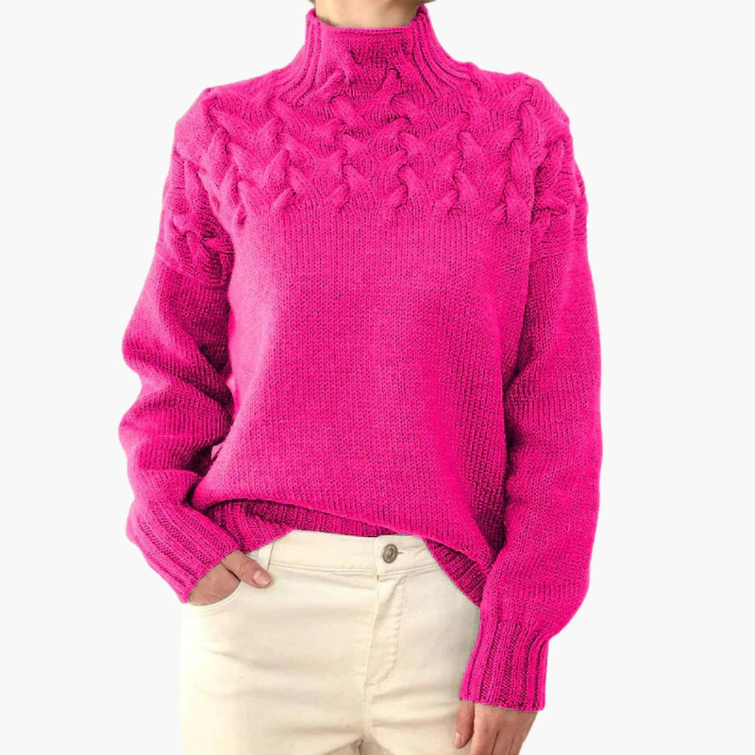 Pull femme à col montant et maille torsadée