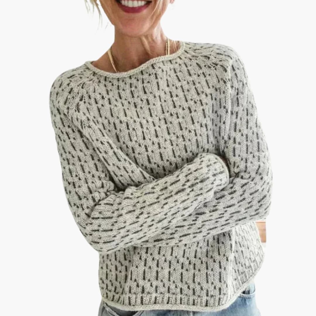 Camisola de mulher com padrão, gola redonda e bainha direita