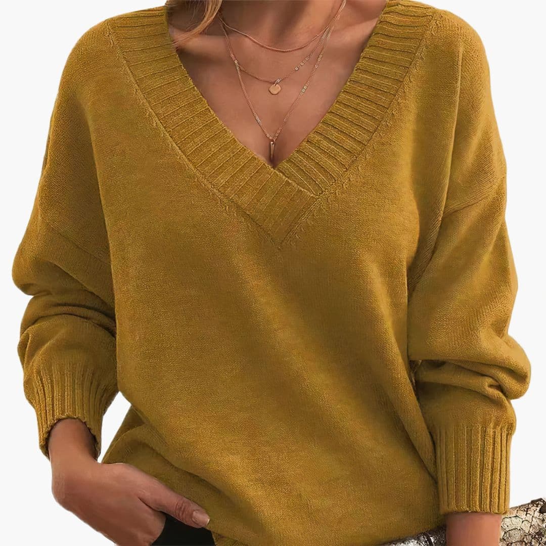 Pull femme col V avec finitions côtelées